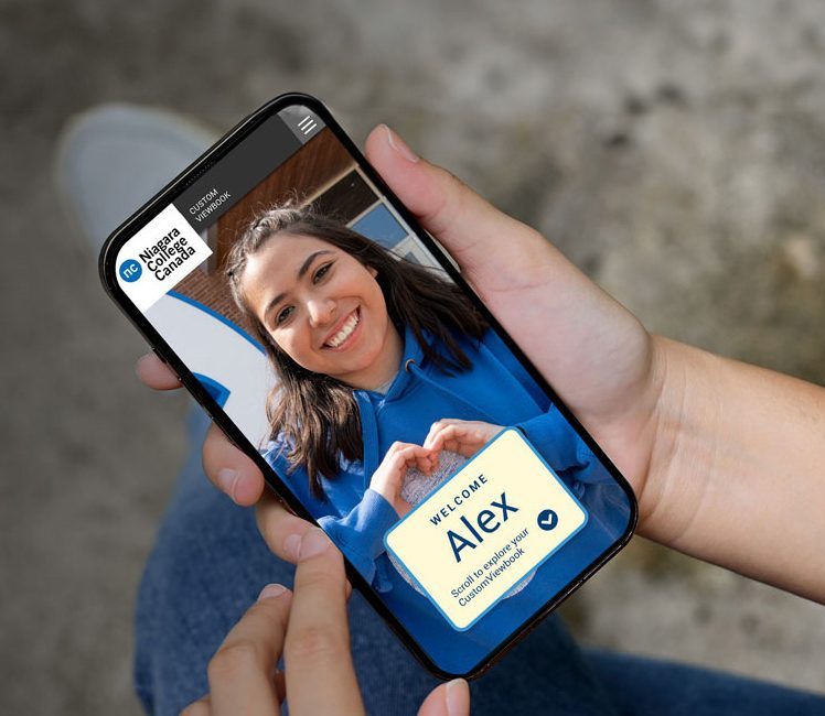 Individual holding a mobile with a welcome screen for Alex, a student at the National College of Canada.